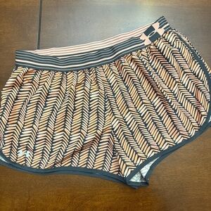 Under Armour Women's Chevron Patterned Shorts - Black and orange